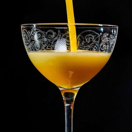 Hotel Pullman Riga Old Town Exterior foto A glass of orange juice