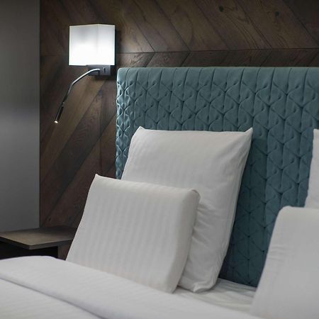 Hotel Pullman Riga Old Town Exterior foto A bed with a headboard