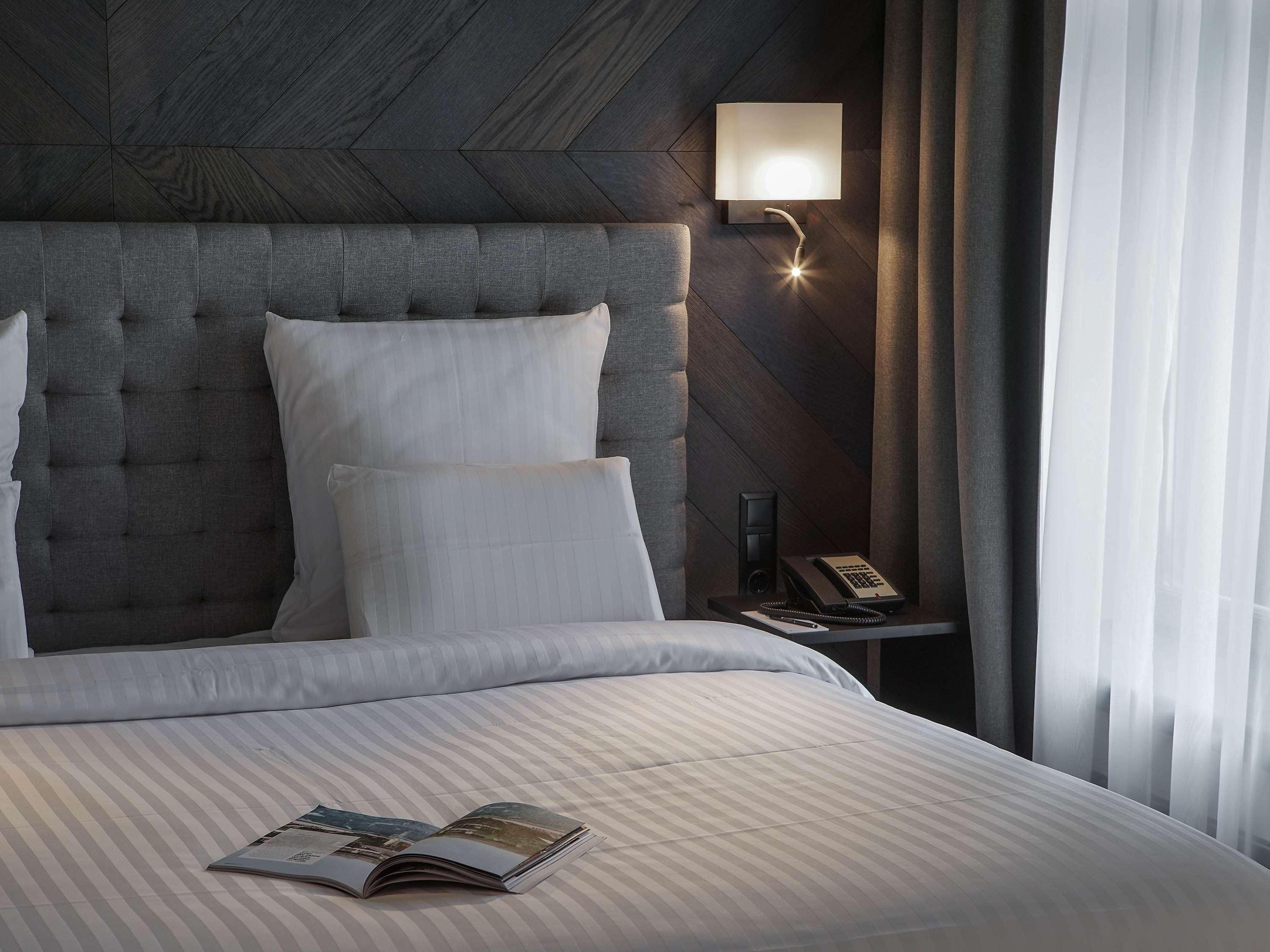 Hotel Pullman Riga Old Town Exterior foto A bedroom at the hotel