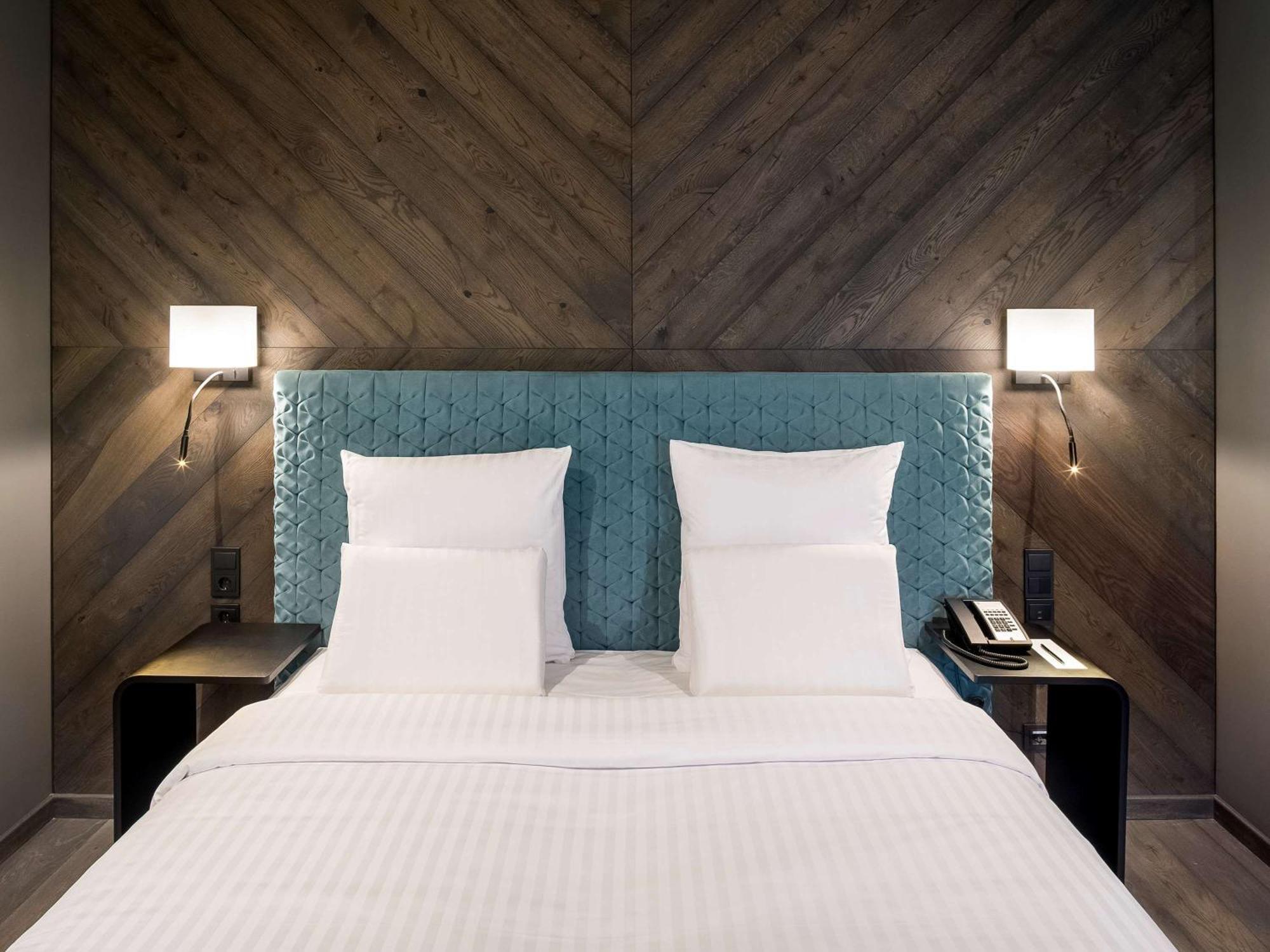 Hotel Pullman Riga Old Town Exterior foto A bedroom at the hotel